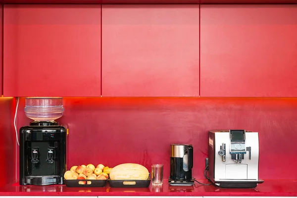 Kitchen with coffee machine, cooler and fruit
