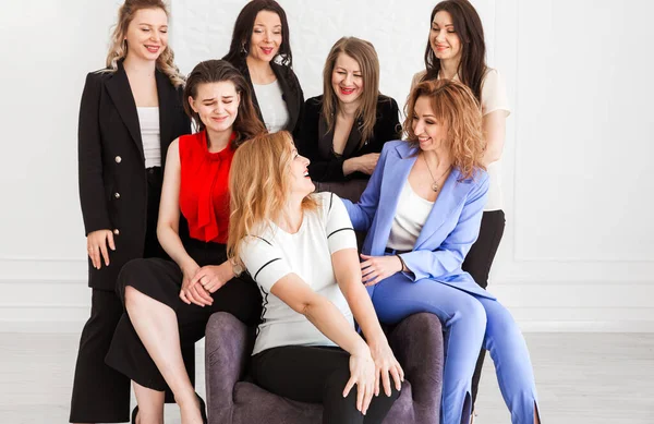 Seven Diverse Colleagues Workers Stand Ans Seat Together Office Hug — Stock Photo, Image