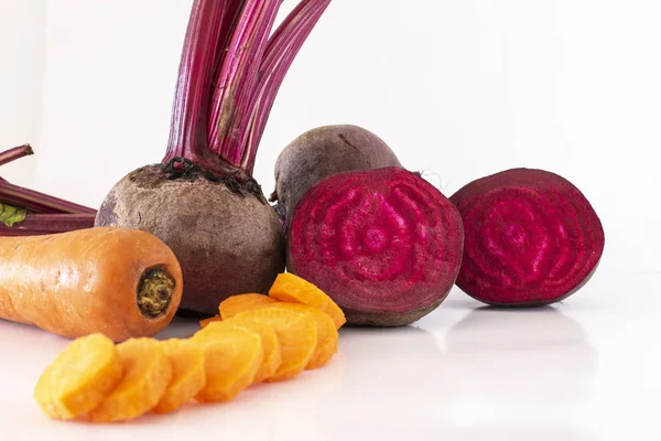 Beet juice with carrot with a white background - Image