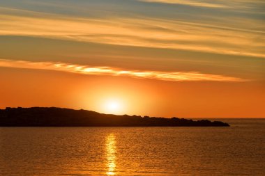 Cala de Sal rossa gündoğumu, Ibiza, İspanya