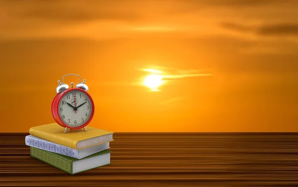 Ein Wecker Drei Büchern Mit Dem Sonnenaufgang Hintergrund Spanien — Stockfoto