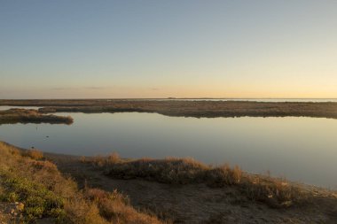 Türkistan delta, İspanya'nın kıyısında günbatımı
