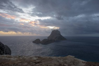 Sunset on the island of Es Vedra next to Ibiza, Spain