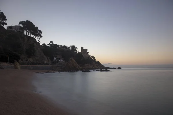 Salida del sol en la playa de Lloret de Mar —  Fotos de Stock