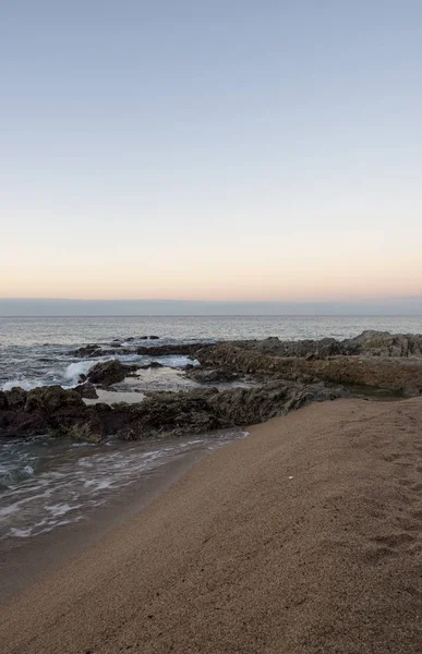 Zonsopgang op het strand van Lloret de Mar — Stockfoto
