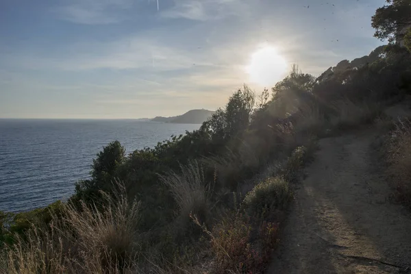 A costa em Lloret de Mar ao pôr-do-sol — Fotografia de Stock