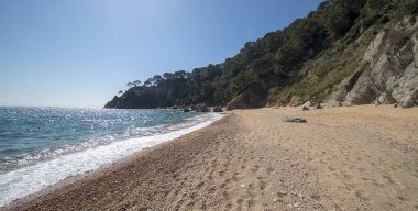 Yuvarlak yolu ile dere llorell, Tossa de mar