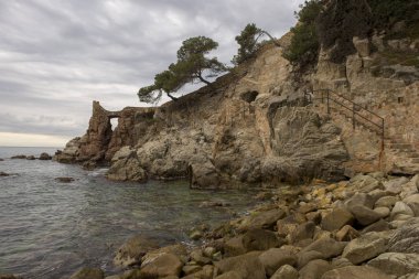 Cala dels gün doğumunda lloret de mar frales