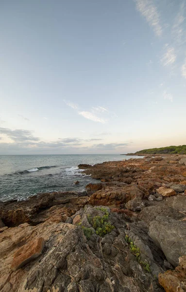 Sunrise between rocks and the Oropesa Sea — Stock Photo, Image