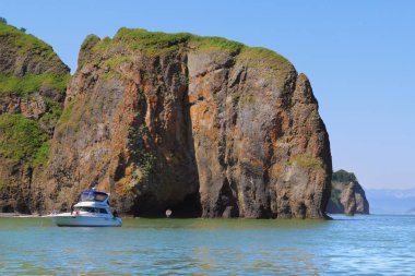 Boat in the Cozy Harbor in Avacha Bay, Kamchatka, Russia clipart