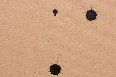 rustik basit karton arka plan üzerinde boya nokta closeup görünümü