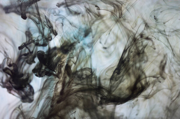 clouds of dark smoke over white background