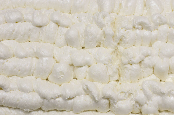 Вид крупным планом на фоне сладкого белого крема
