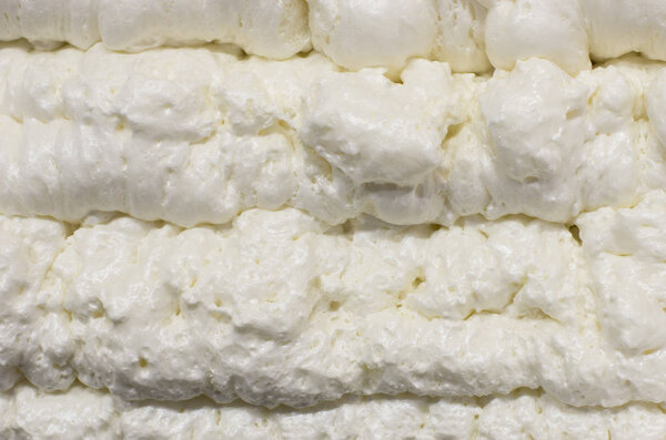 Вид крупным планом на фоне сладкого белого крема
