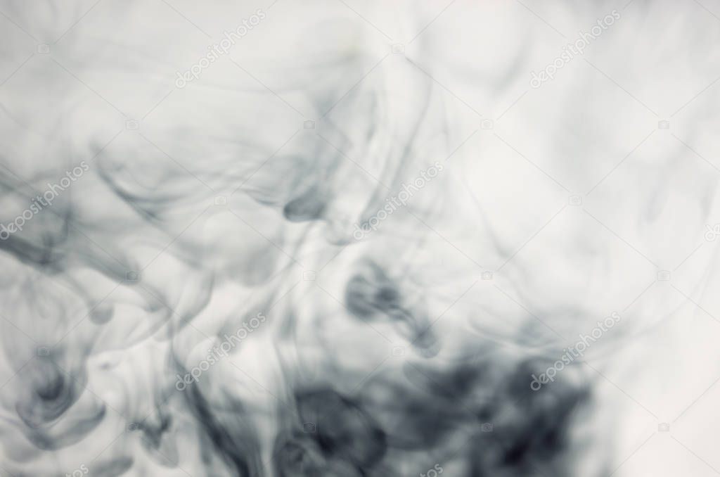 clouds of dark smoke over white background