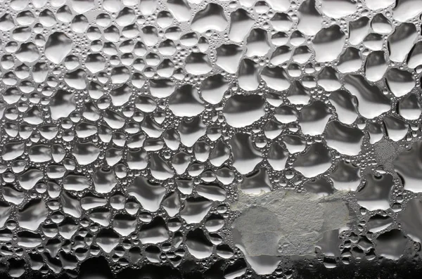 ガラスに水の滴のクローズ アップ ビュー — ストック写真
