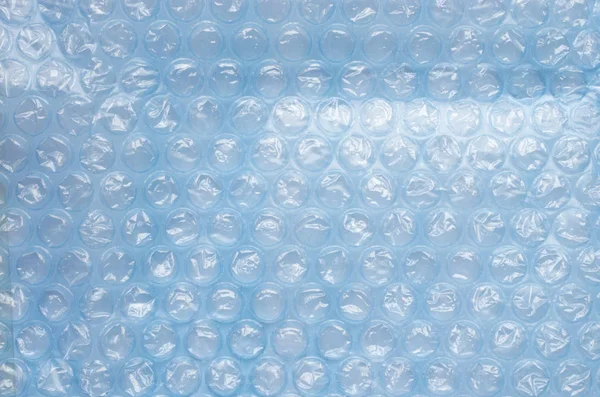 Пузырь Обертывания Голубом Фоне — стоковое фото