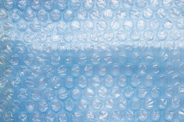 Пузырь Обертывания Голубом Фоне — стоковое фото
