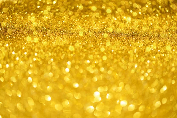 Urlaub abstrakte Textur. Weihnachtskarte mit Kopierplatz. Gold Bokeh Hintergrund, defokussierte Lichter. — Stockfoto