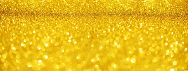 Gold-Glitzerbanner. glänzende abstrakte strukturierte Hintergrund mit goldenen Lichtern, Bokeh. Weihnachten, Neujahrskonzept mit Kopierraum zur Begrüßung. — Stockfoto