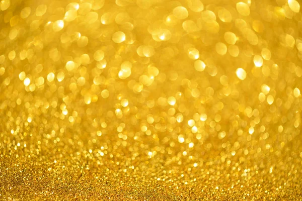 Urlaub abstrakte Textur. Weihnachtskarte mit Kopierplatz. Gold Bokeh Hintergrund, defokussierte Lichter. — Stockfoto