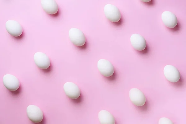 Food concept with white chicken eggs on pink background. Top view. Creative pattern in minimal style. Flat lay. — 스톡 사진