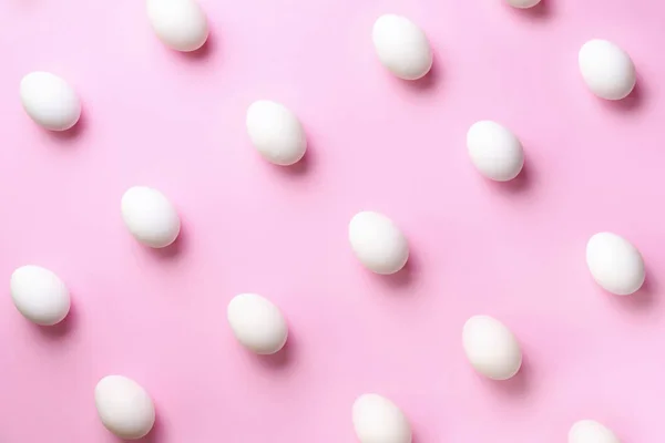 Food concept with white chicken eggs on pink background. Top view. Creative pattern in minimal style. Flat lay. — 스톡 사진