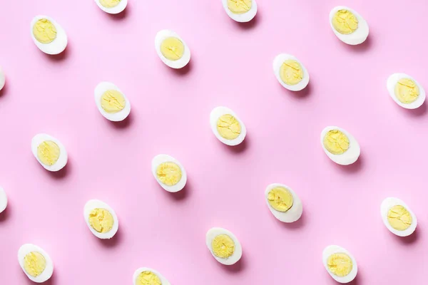 Food concept with boiled eggs pattern on pink background. Top view. Creative pattern in minimal style. Flat lay. — 스톡 사진