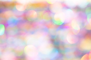 Tatil ışıklarının renkli bulanık arka planı. Bayram tebrik kartı. Yeni yıl ve Noel dokusu