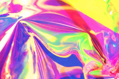 Holografik yanardöner yüzey. Uzayı kopyala Parlak renkli hologram geçmişi. Birden fazla renkle buruşmuş soyut doku. Neon yüzeyi.