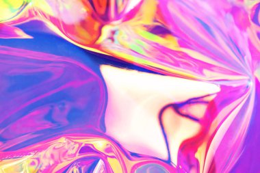 Holografik yanardöner yüzey. Uzayı kopyala Parlak renkli hologram geçmişi. Birden fazla renkle buruşmuş soyut doku. Neon yüzeyi.