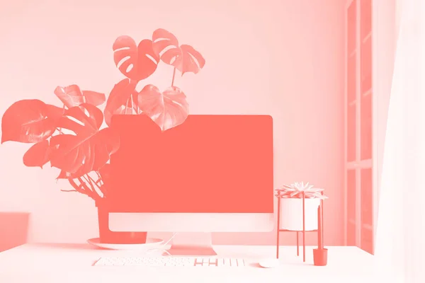 Espacio de trabajo del diseñador. Oficina minimalista en casa. Computadora de escritorio de pantalla en blanco, Computadora de escritorio Mockup, lámpara, tableta gráfica, teclado, ratón, pluma, planta suculenta en color coral de moda — Foto de Stock