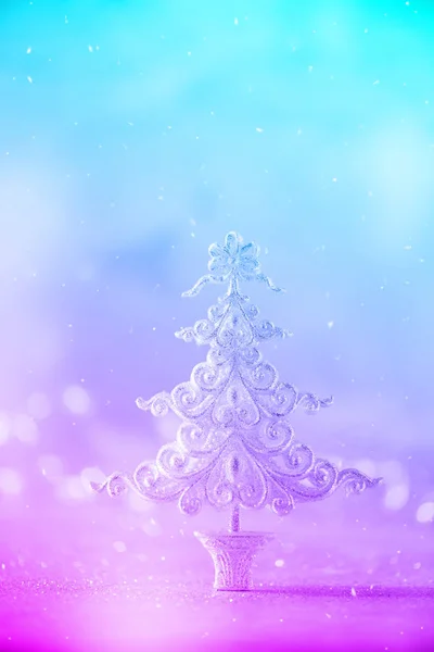 Silver glitter Christmas tree in trendy neon colors. Rainbow gradient background with lights bokeh, copy space. Greeting card for new year party. Festive holiday concept. Banner — Stock Photo, Image
