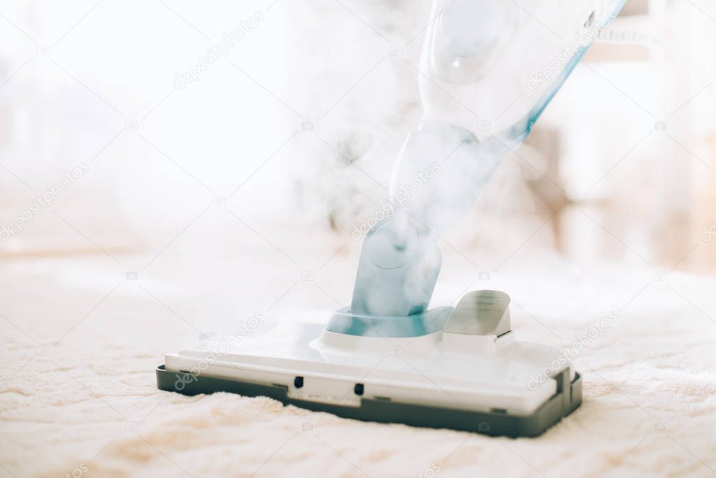 Cleaning the floor with steam cleaner. Banner and copy space. Cleaning service concept