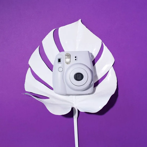 Vilnius, Lithuania - September 16, 2019: Fujifilm Instax Mini Instant Film Camera on violet background. — ストック写真