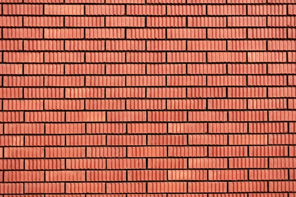 Textura de pared de ladrillo rojo. Fondo con espacio de copia para el diseño — Foto de Stock