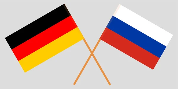 De gekruiste vlaggen van Rusland en Duitsland. Vector — Stockvector