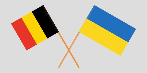 Korsade flaggor för Ukraina och Belgien. Officiella färger. Korrekta proportioner. Vektor — Stock vektor