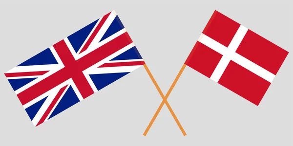 Regno Unito e Danimarca. Bandiere inglesi e danesi incrociate. Colori ufficiali. Corretta proporzione. Vettore — Vettoriale Stock