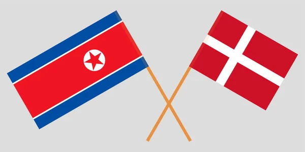 Corea del Nord e Danimarca. Bandiere coreane e danesi incrociate. Colori ufficiali. Corretta proporzione. Vettore — Vettoriale Stock