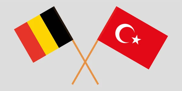 De korsade flaggorna för Turkiet och Belgien. Officiella färger. Vektor — Stock vektor