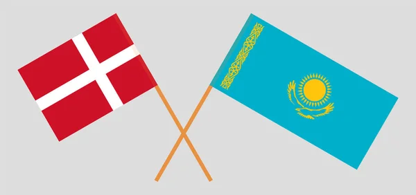 Banderas cruzadas de Kazajstán y Dinamarca — Archivo Imágenes Vectoriales