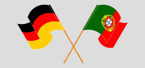 Banderas cruzadas y ondeando de Portugal y Alemania — Archivo Imágenes Vectoriales