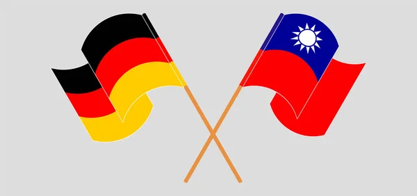 ธงไขว้และโบกมือของไต้หวันและเยอรมนี — ภาพเวกเตอร์สต็อก