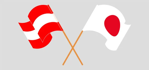 Banderas cruzadas y ondeantes de Austria y Japón — Vector de stock
