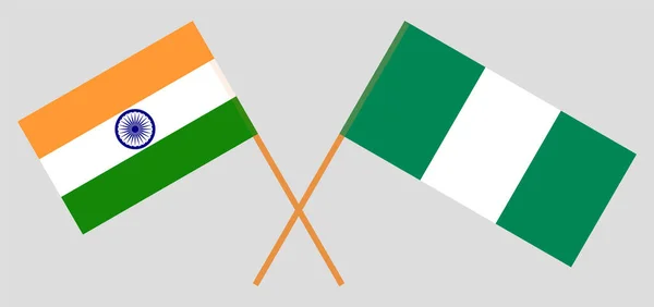 Nigéria és India keresztezett lobogói — Stock Vector