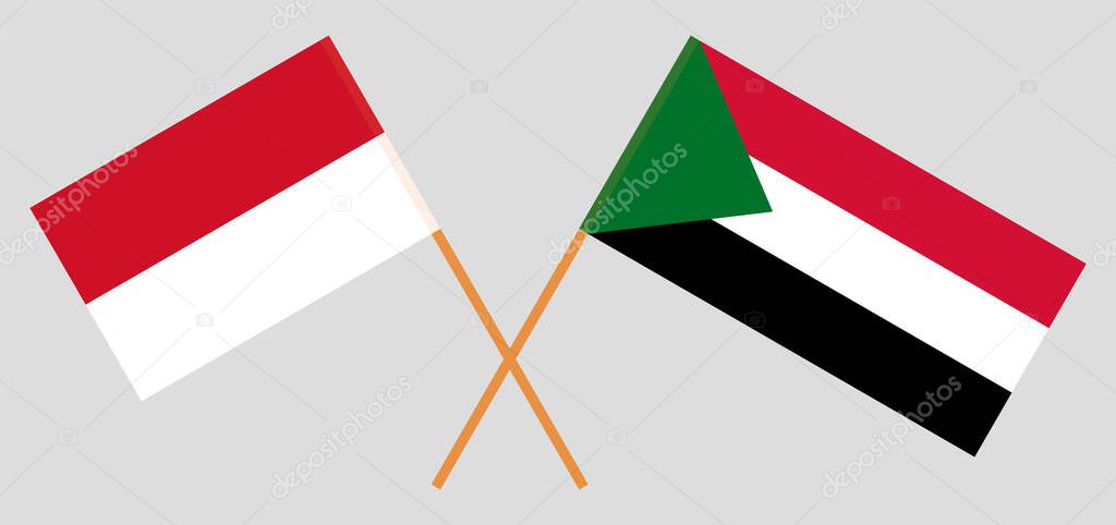 Crossed flags of Sudan and Indonesia