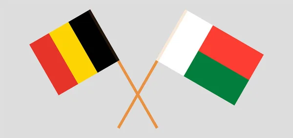 Bendera silang Madagaskar dan Belgia - Stok Vektor