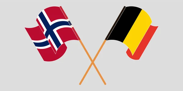 Banderas cruzadas y ondeando de Noruega y Bélgica — Archivo Imágenes Vectoriales