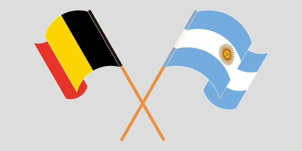 阿根廷和比利时横渡和飘扬的国旗 — 图库矢量图片